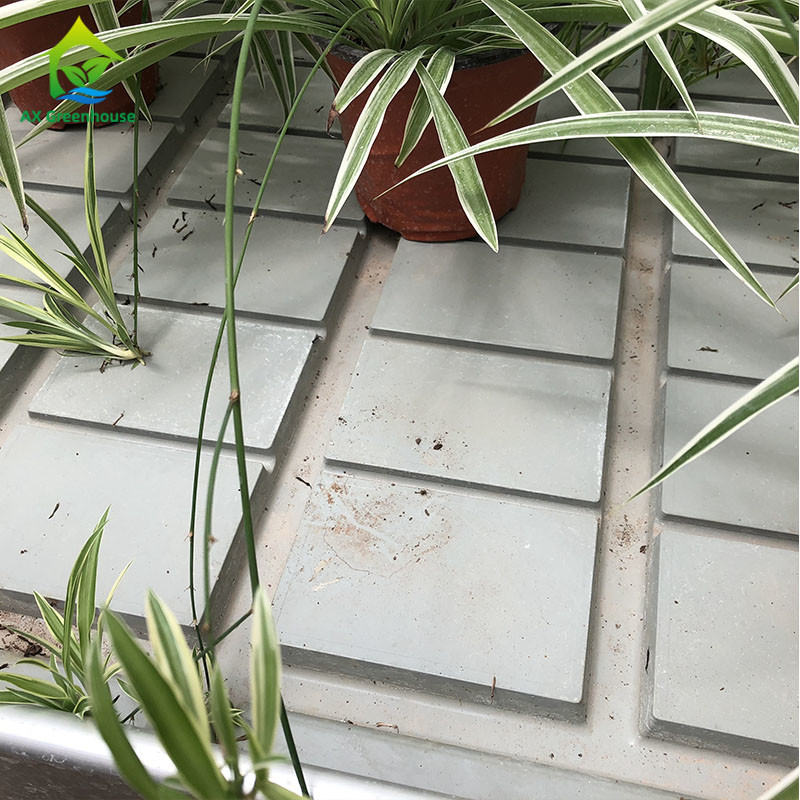 温室で植物を育てるための浮き沈み水分栽培移動テーブルローリングベンチ